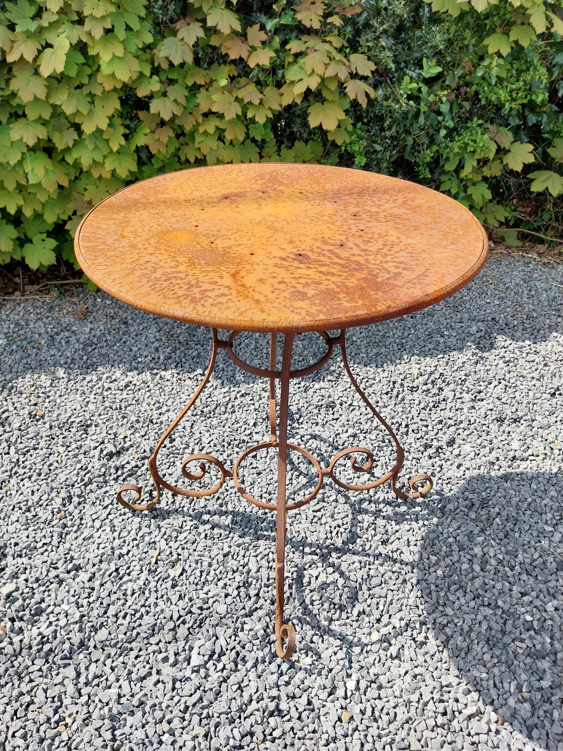 Wrought iron café - garden circular table with two matching chairs {Tbl. 75 cm H x 70 cm Dia. Chairs - Image 9 of 10