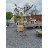 Decorative wrought iron bird feeder in the form of a tree and two hanging bird cages {224 cm H x 135