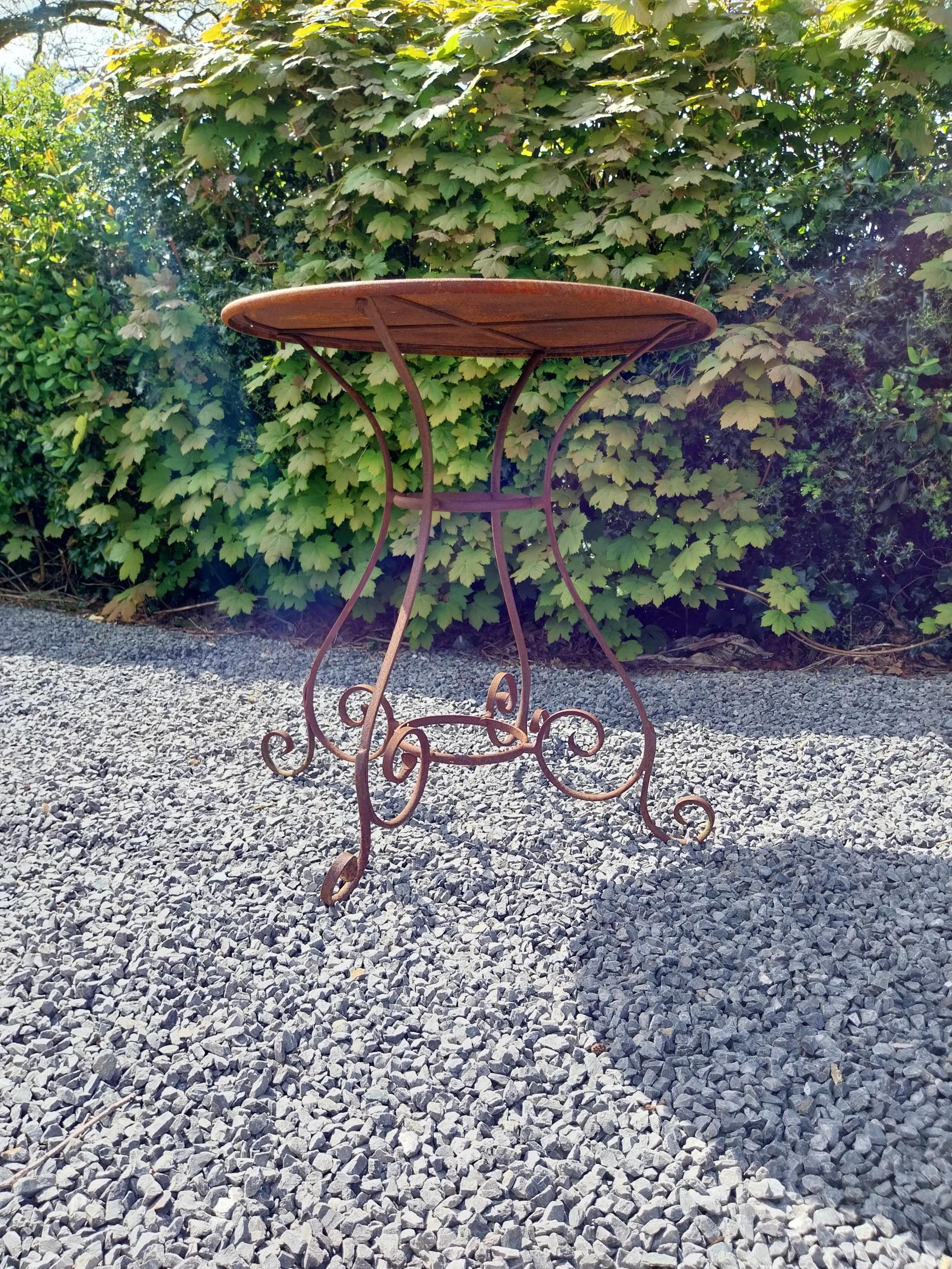 Wrought iron café - garden circular table with two matching chairs {Tbl. 75 cm H x 70 cm Dia. Chairs - Image 10 of 10