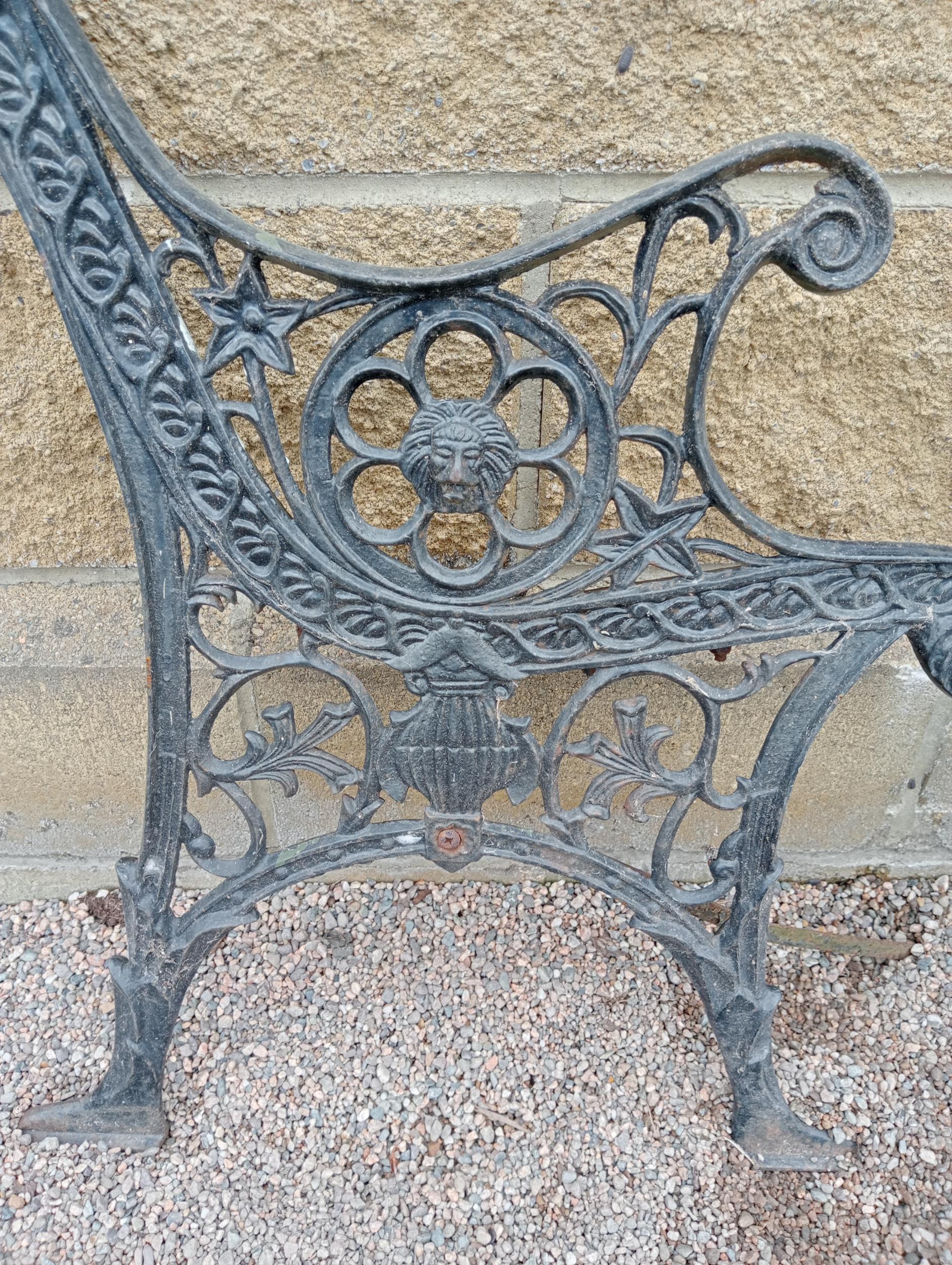 Pair of cast iron bench ends with decorated with lions heads {H 73cm x D 60cm }. (NOT AVAILABLE TO - Image 2 of 2