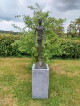 Exceptional quality contemporary bronze sculpture of a Man raised on slate plinth {Overall