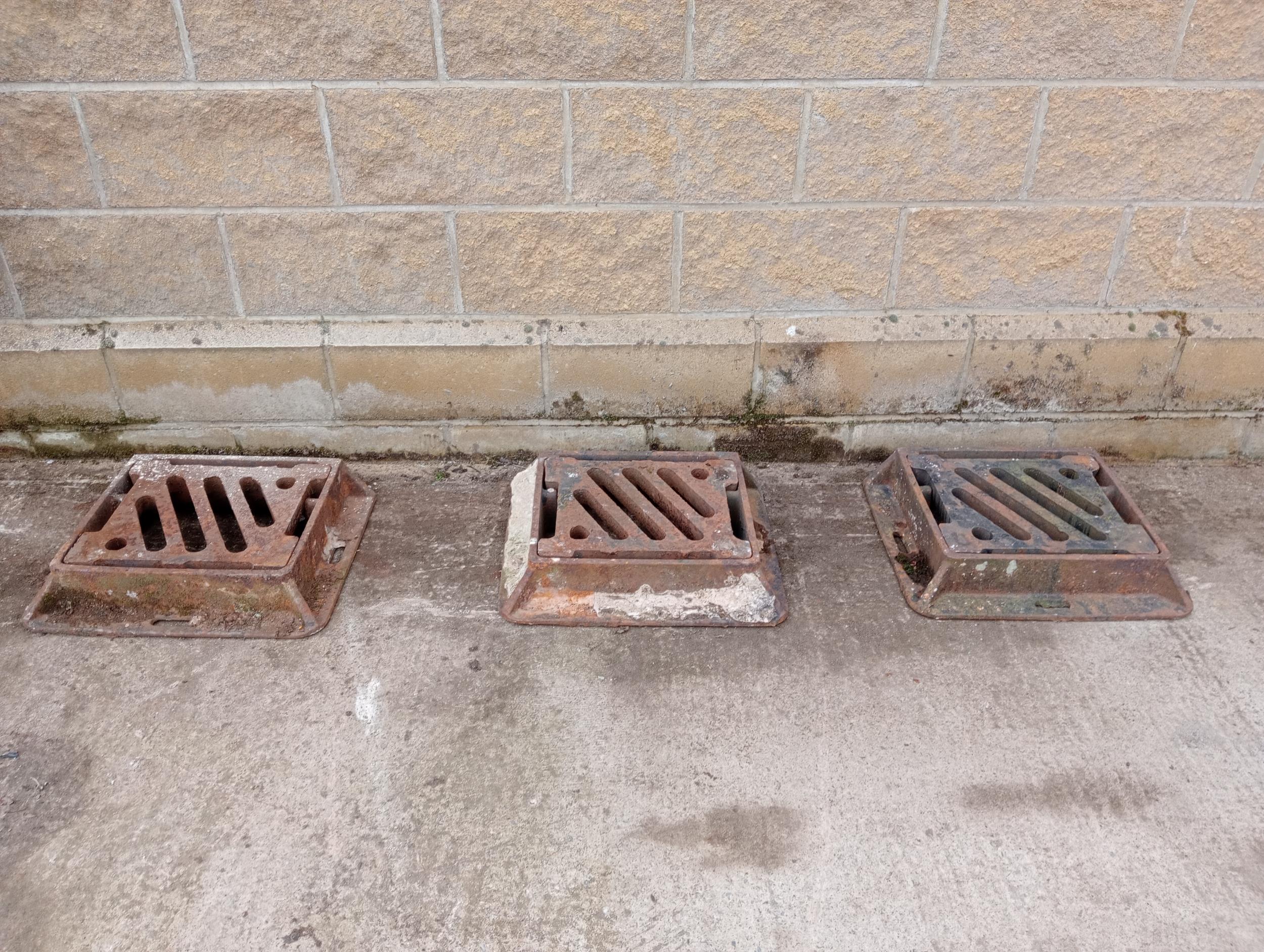 Three cast iron manholes {H 10cm x W 54cm x D 44cm }. (NOT AVAILABLE TO VIEW IN PERSON)