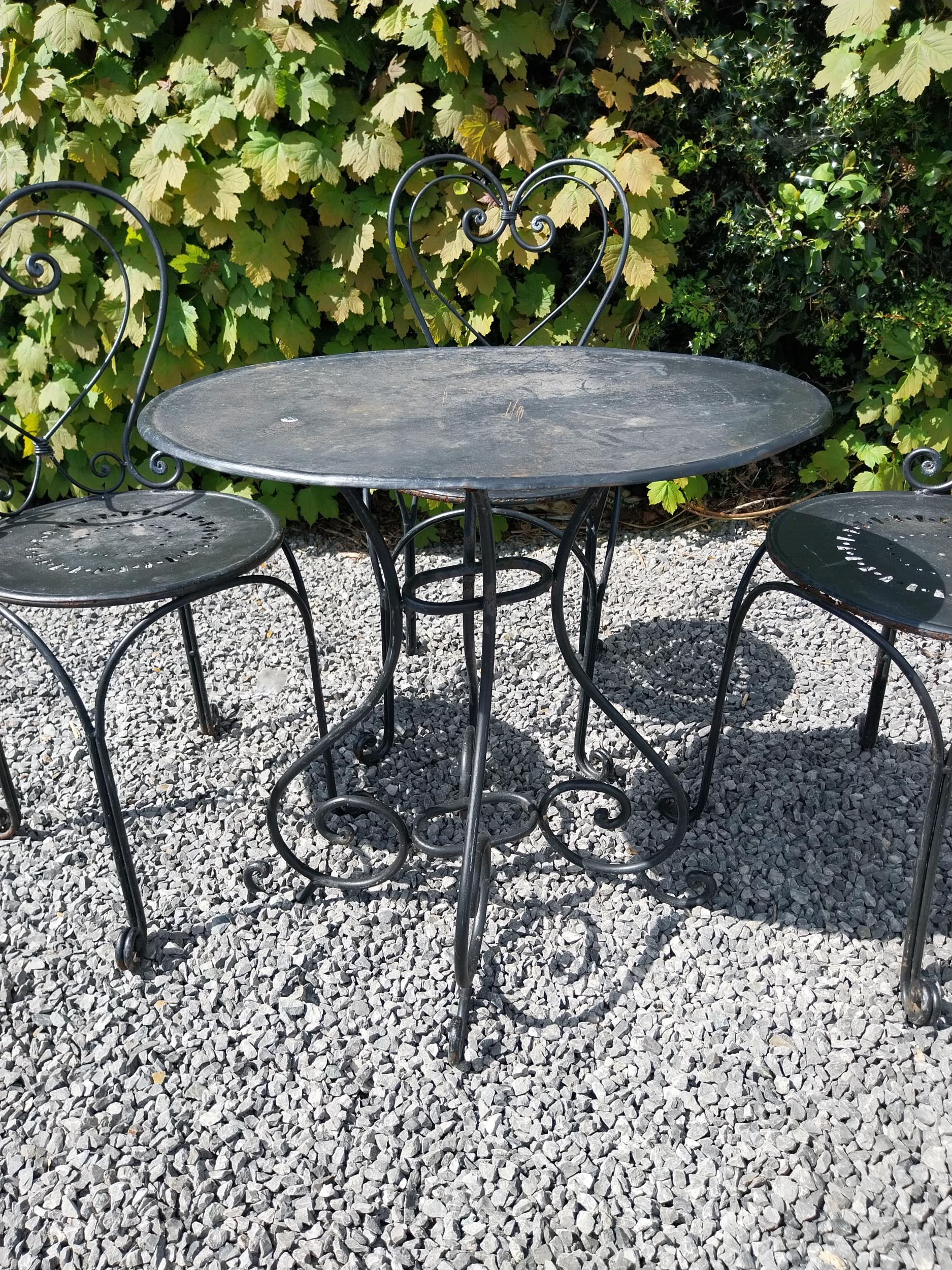 Wrought iron garden table with three matching chairs {Tbl. 65 cm H x 65 cm Dia. and Chairs 82 cm H x - Image 4 of 11