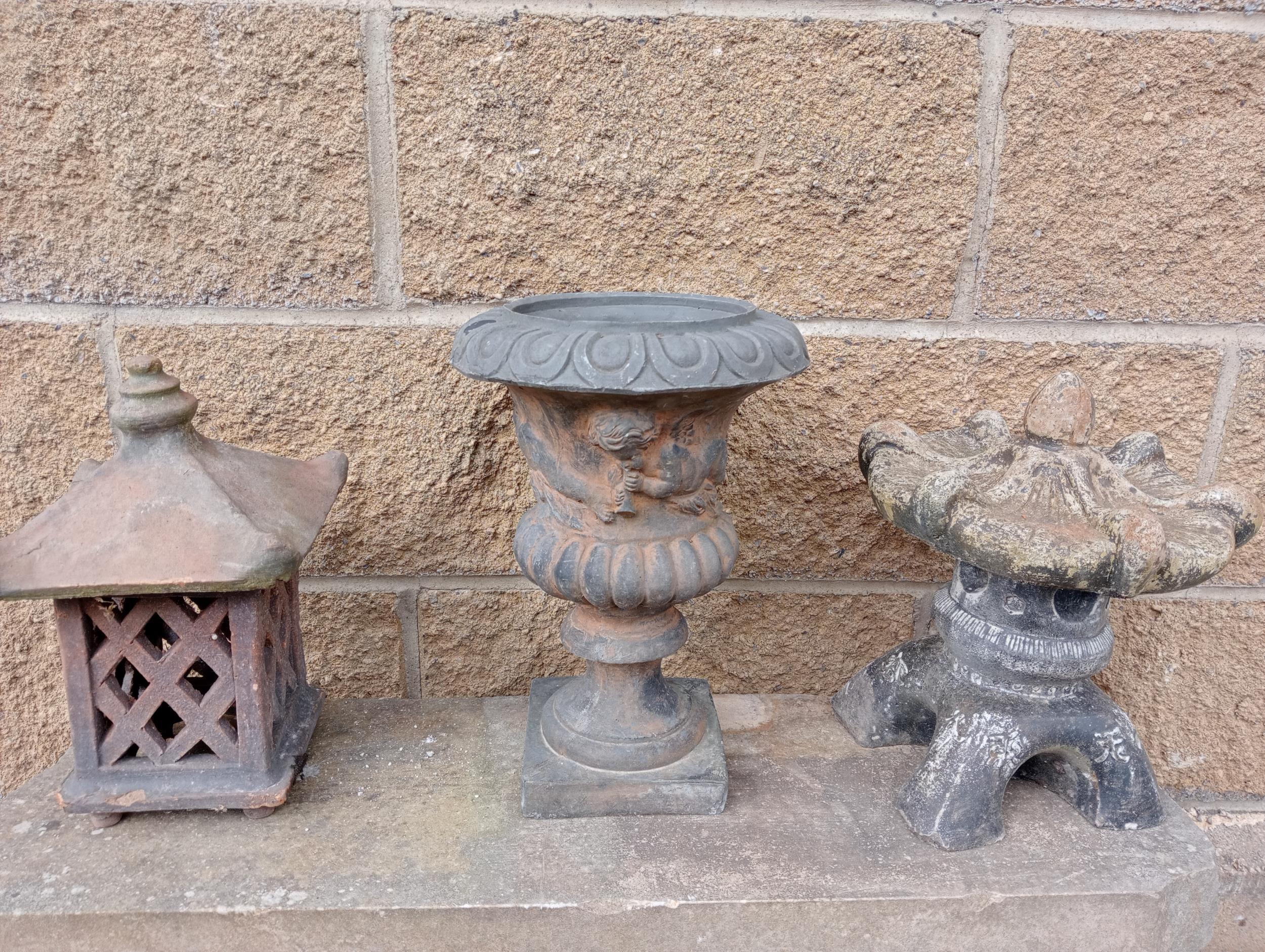 Three garden ornaments {H 34cm down to H 30cm }. (NOT AVAILABLE TO VIEW IN PERSON)