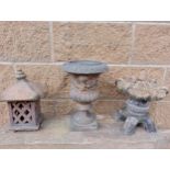 Three garden ornaments {H 34cm down to H 30cm }. (NOT AVAILABLE TO VIEW IN PERSON)