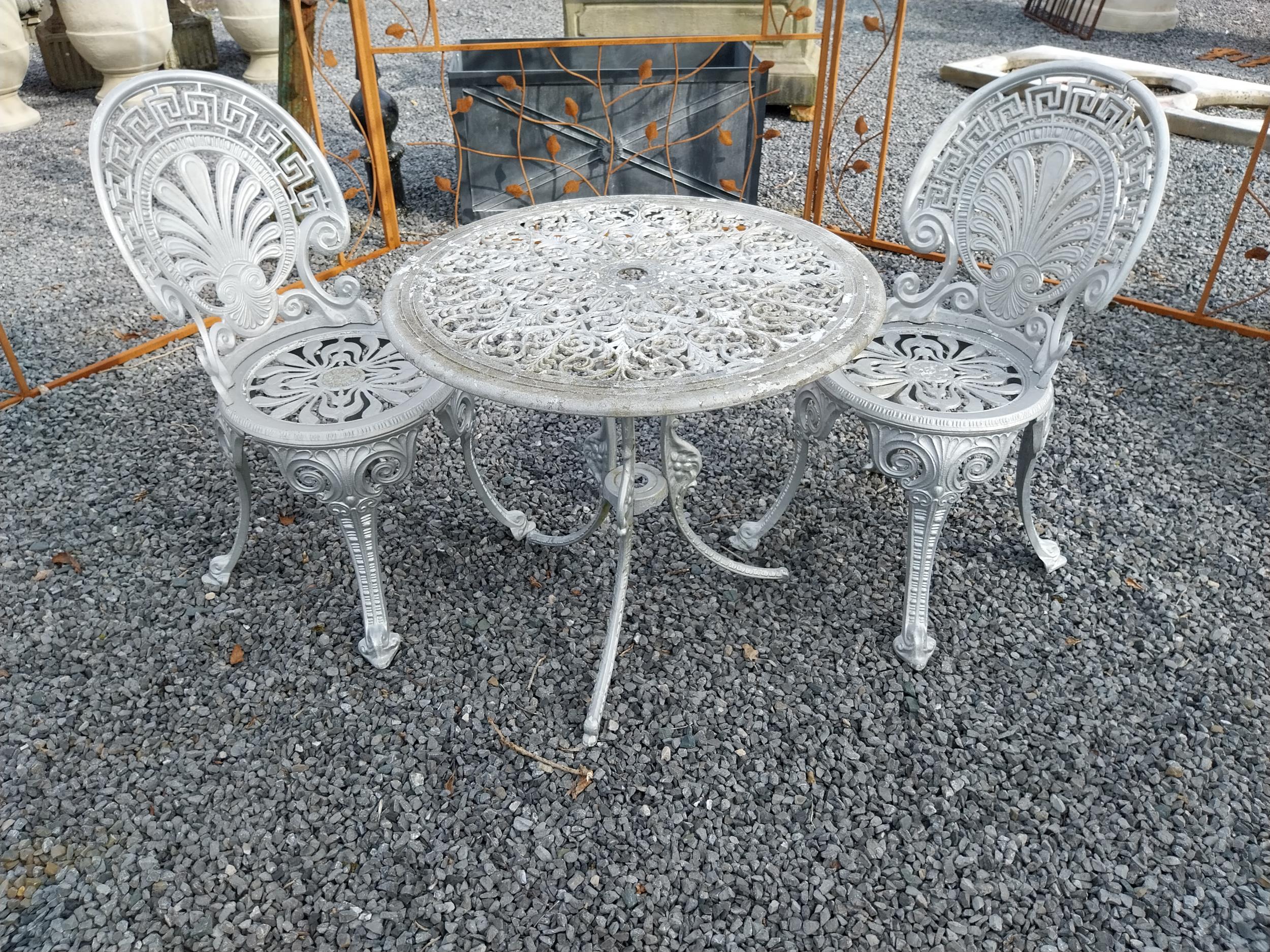1950s cast aluminium garden table with two matching chairs {Tbl. 62 cm H x 68 cm Dia. and Chairs