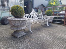 Pair of moulded urns decorated with swags and rosettes {60 cm H x 60 cm Dia.}.