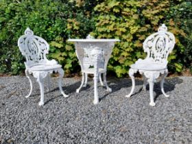 19th C. cast iron garden table with three matching chairs {Tbl. 68 cm H x 59 cm Dia. and Chairs 83