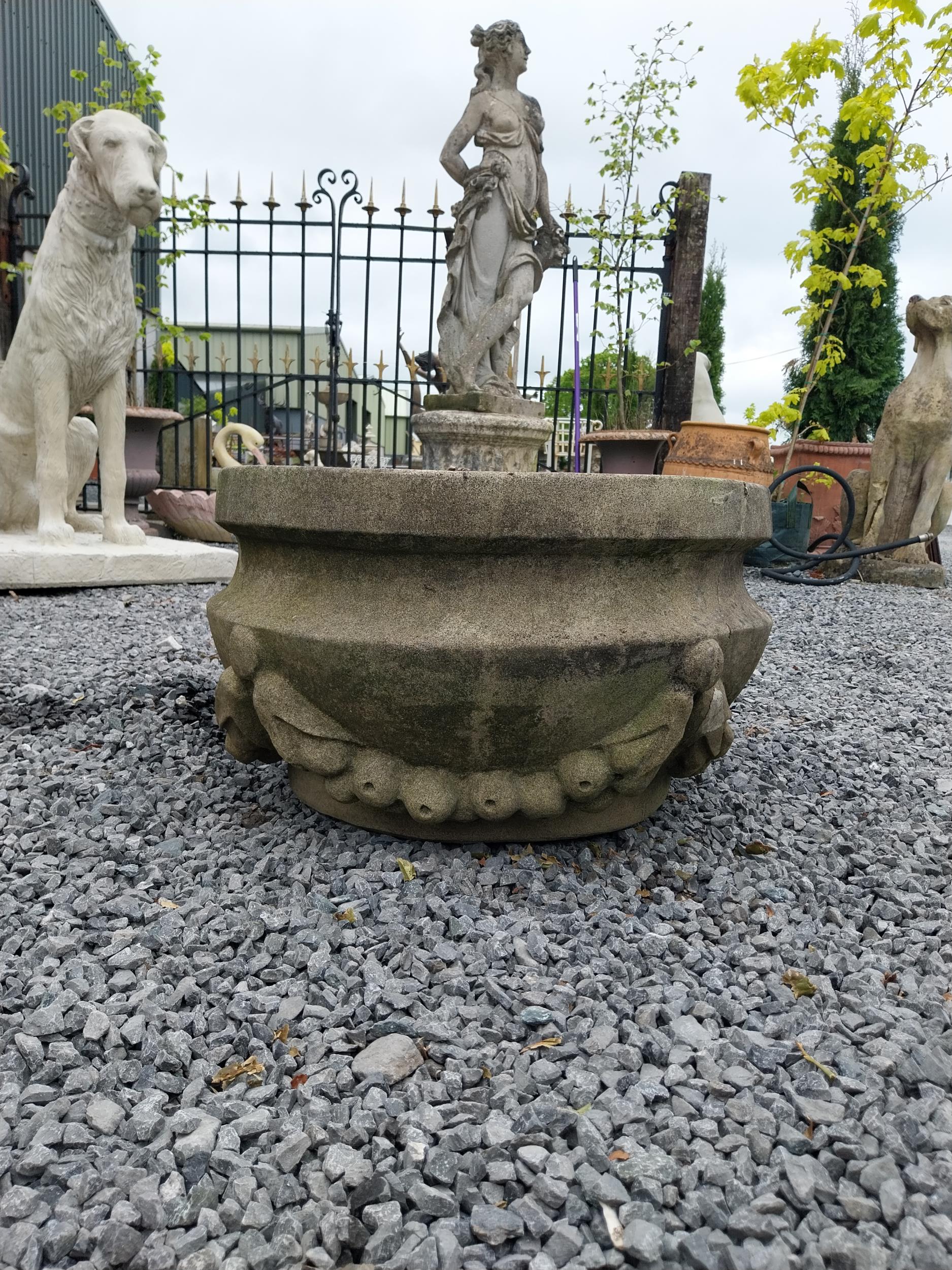 Good quality carved sandstone planter decorated with swags {37 cm H x 80 cm W x 61 cm D}. - Image 7 of 7