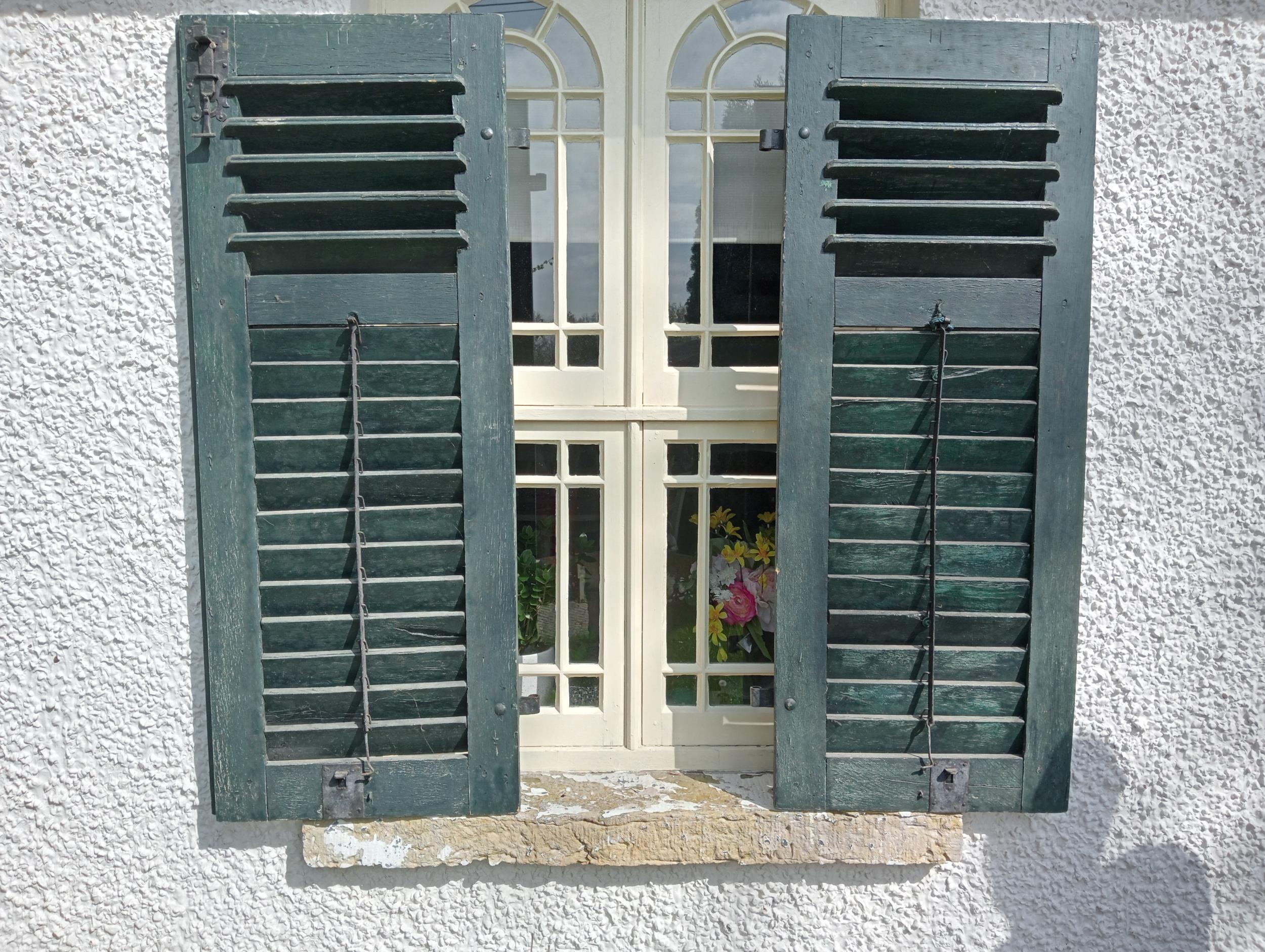 Pair of French style green louvred window shutters {H 134cm x W 105cm x D 5cm}.