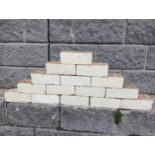 Collection of one hundred white glazed bricks {H 8cm x W 23cm x D 11cm }.