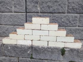 Collection of one hundred white glazed bricks {H 8cm x W 23cm x D 11cm }.