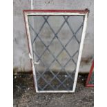 Pair of cast iron leaded glass windows {Each H 90cm x W 48cm }. (NOT AVAILABLE TO VIEW IN PERSON)