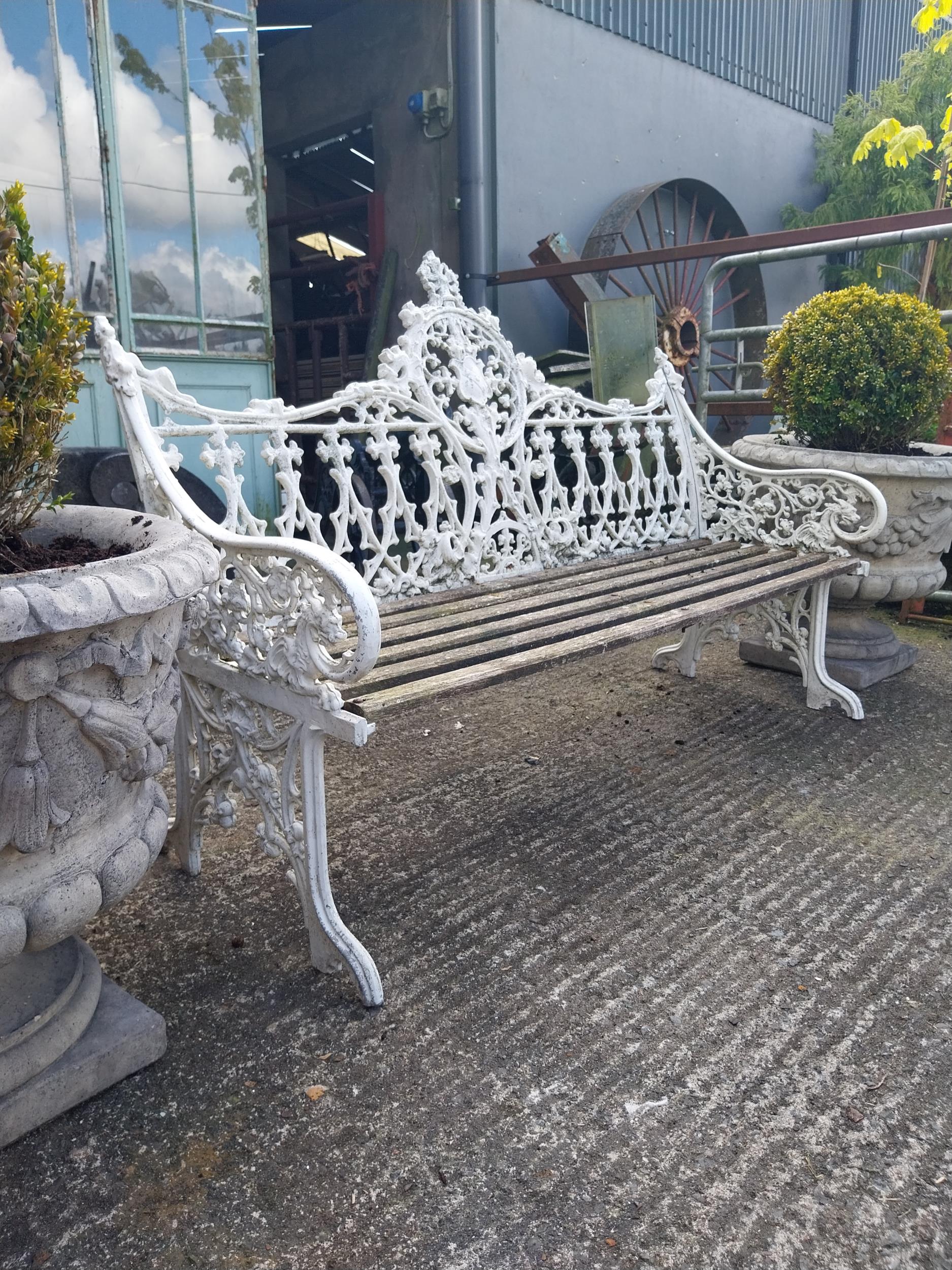 Decorative cast alloy garden bench in the Victorian style {99 cm H x 150 cm W x 68 cm D}. - Image 6 of 8