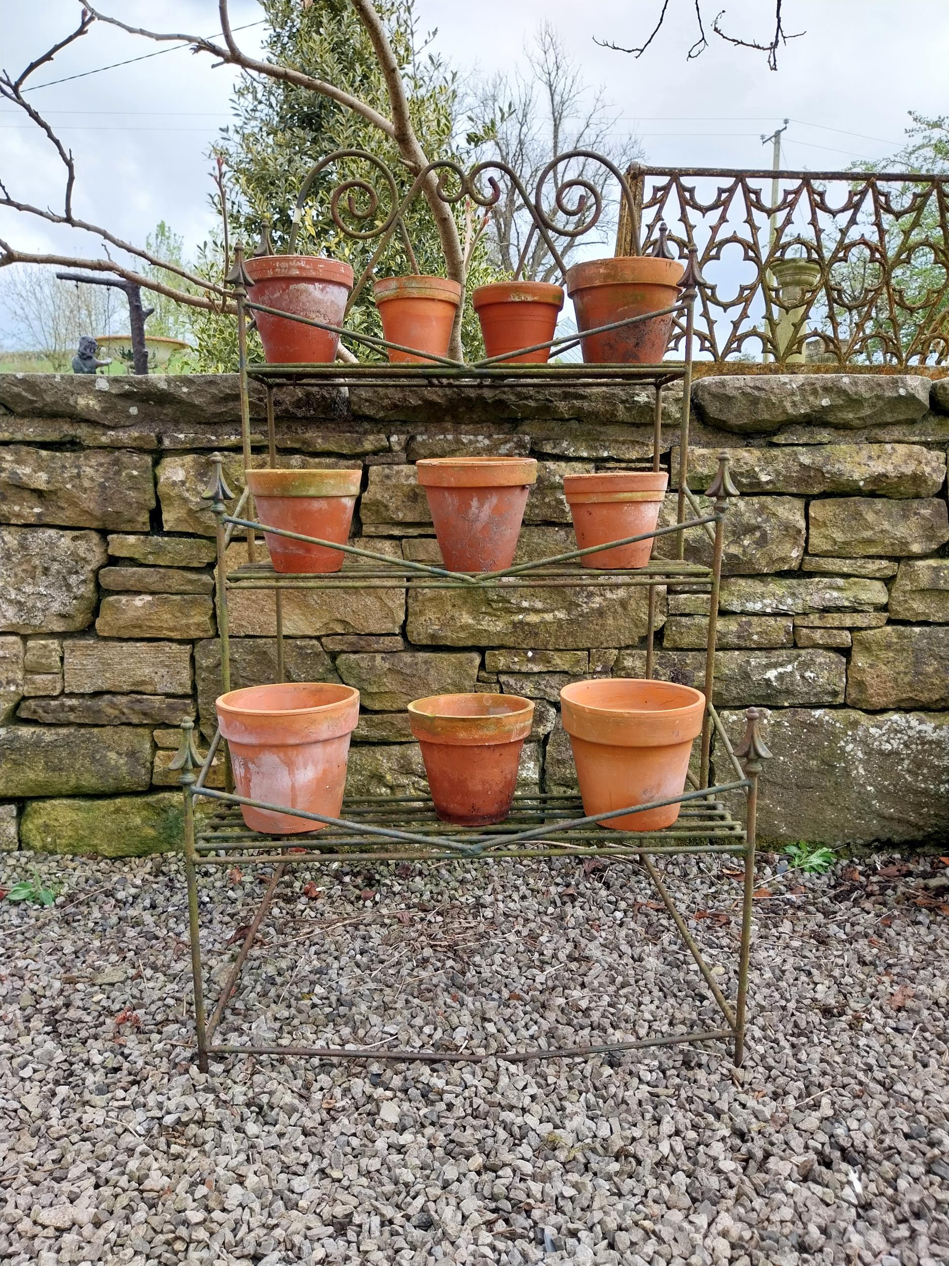Early 20th C. wrought iron waterfall plant stand {127 cm H x 70 cm W x 64 cm D}.