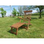 Good quality teak and brass deck chair {93 cm H x 61 cm W x 150 cm L}.