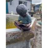 Good quality bronze figure of a Boy reading {30 cm H x 24 cm W x 24 cm D}.