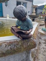 Good quality bronze figure of a Boy reading {30 cm H x 24 cm W x 24 cm D}.