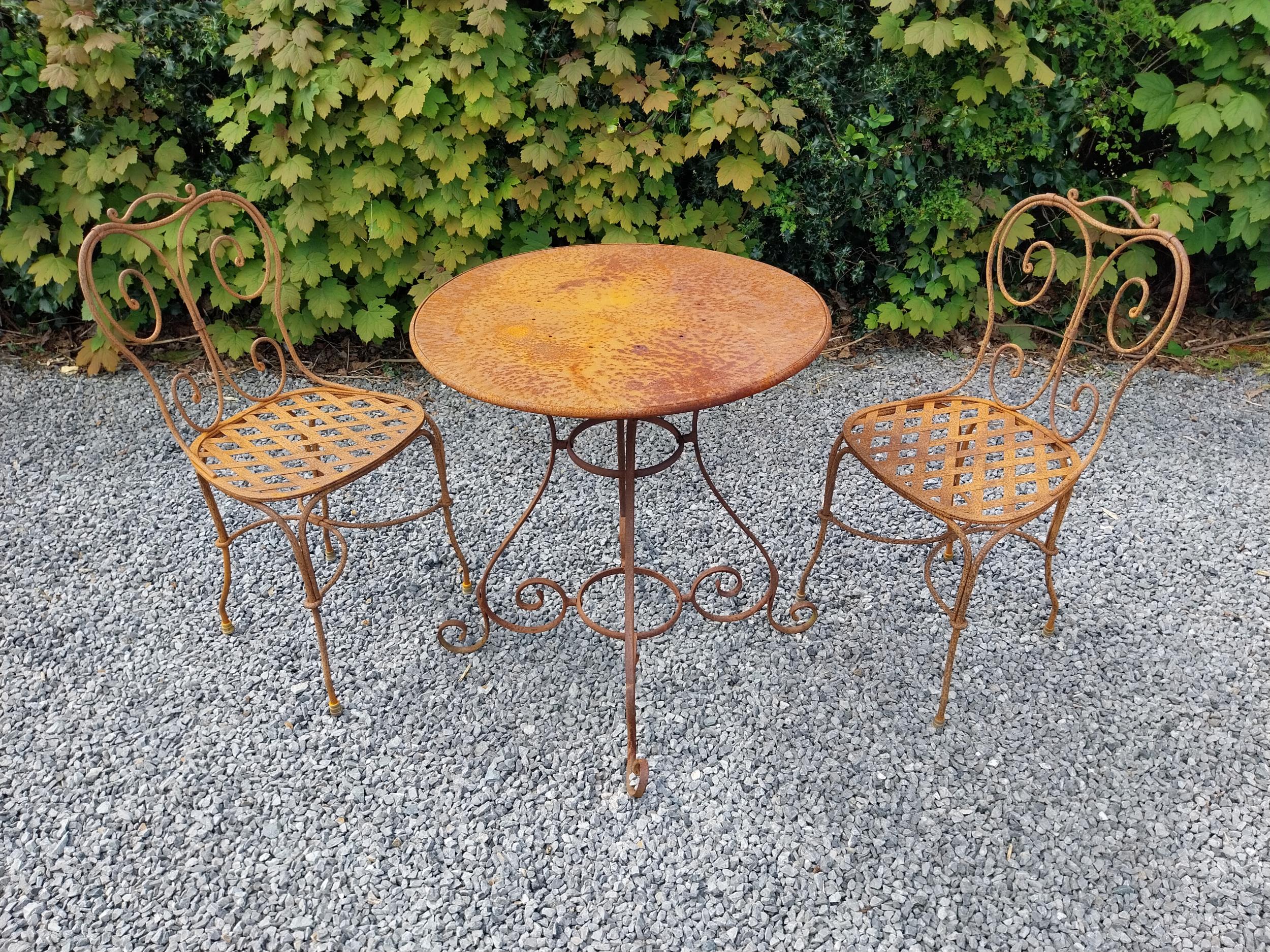 Wrought iron café - garden circular table with two matching chairs {Tbl. 75 cm H x 70 cm Dia. Chairs - Image 2 of 10