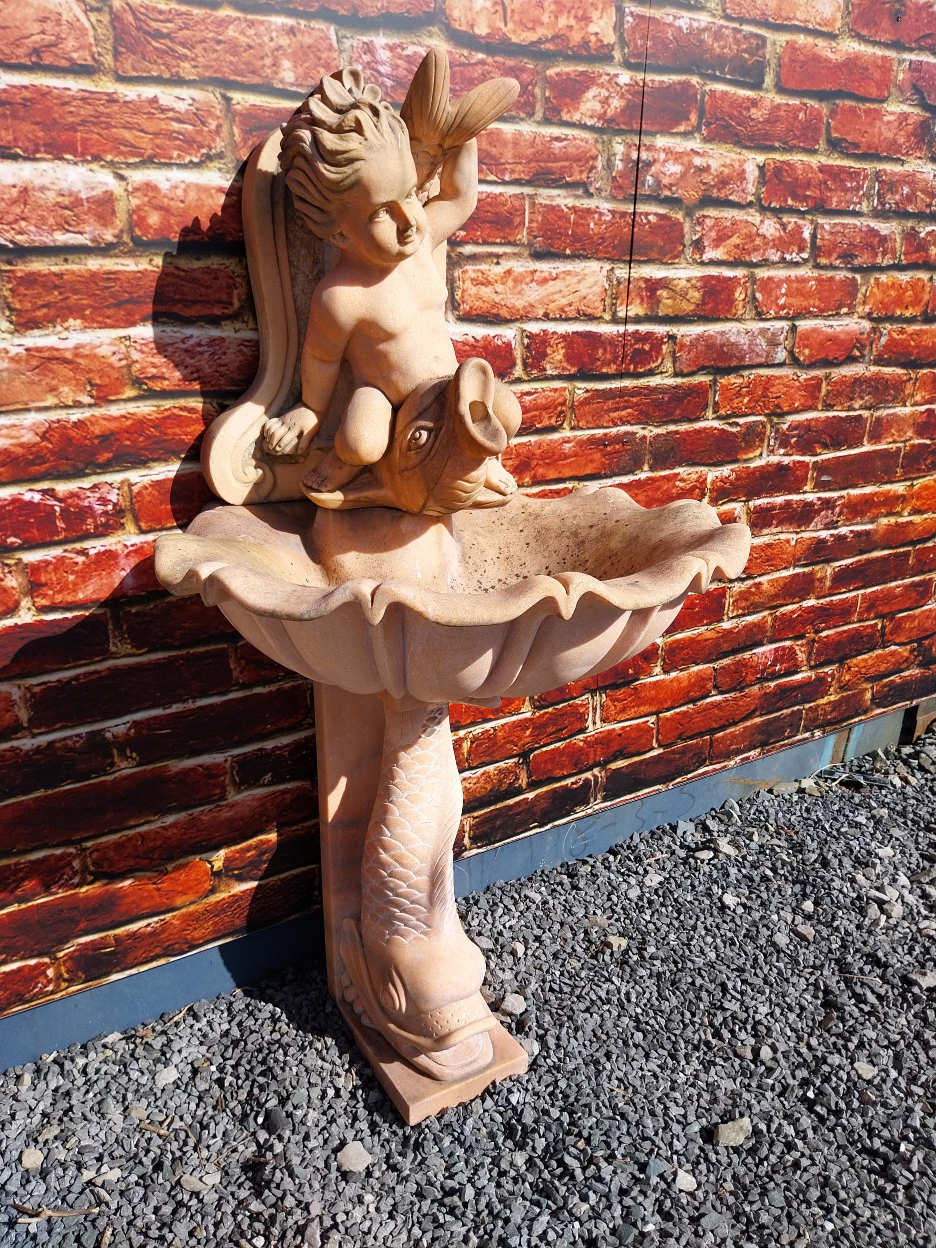 Pink marble wall fountain decorated with fish and boy {137 cm H x 70 cm W}. (NOT AVAILABLE TO VIEW - Image 2 of 9