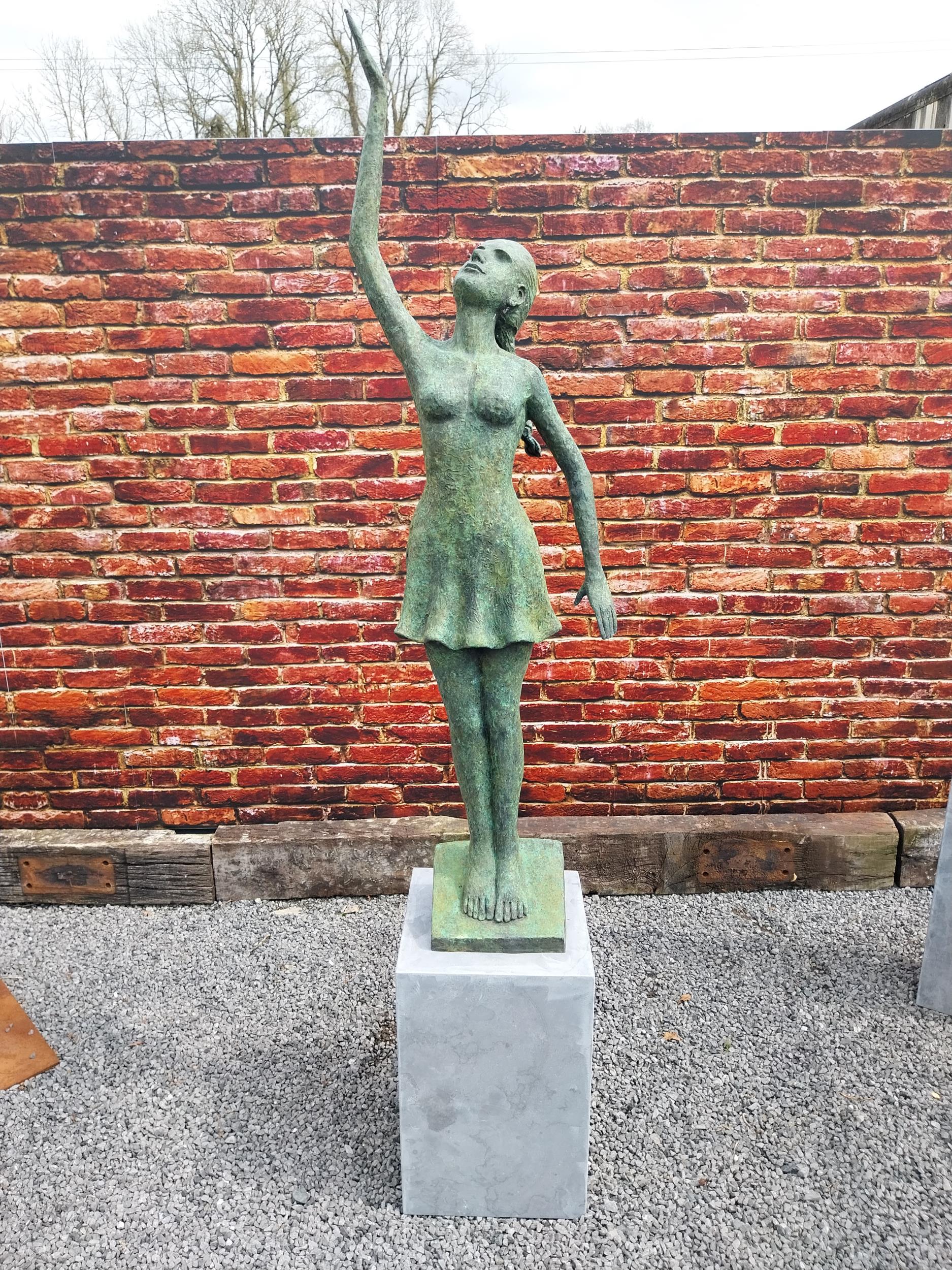 Exceptional quality bronze contemporary sculpture of a Lady with raised arm on slate plinth {Overall