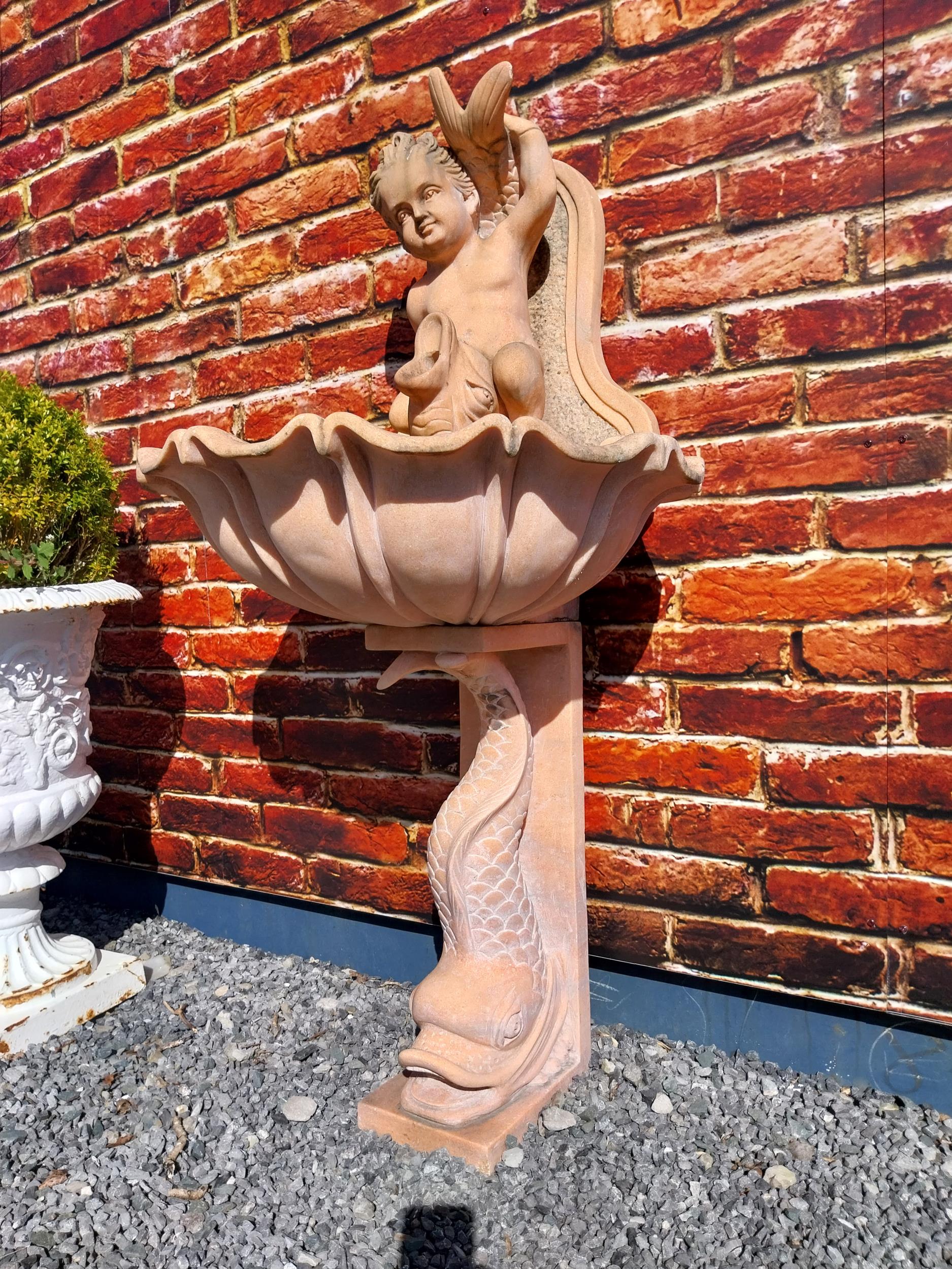 Pink marble wall fountain decorated with fish and boy {137 cm H x 70 cm W}. (NOT AVAILABLE TO VIEW - Image 3 of 9