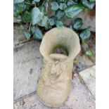 Composition stone planter in the form of a boot {H 21cm x W 24cm x D 46cm }. (NOT AVAILABLE TO