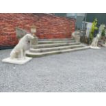 Pair of good quality moulded sandstone statues of Irish Wolf Hounds mounted on platform base {119 cm