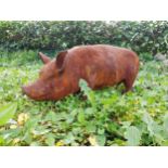 Good quality cast iron statue of a Pig {29 cm H x 70 cm W x 20 cm D}.