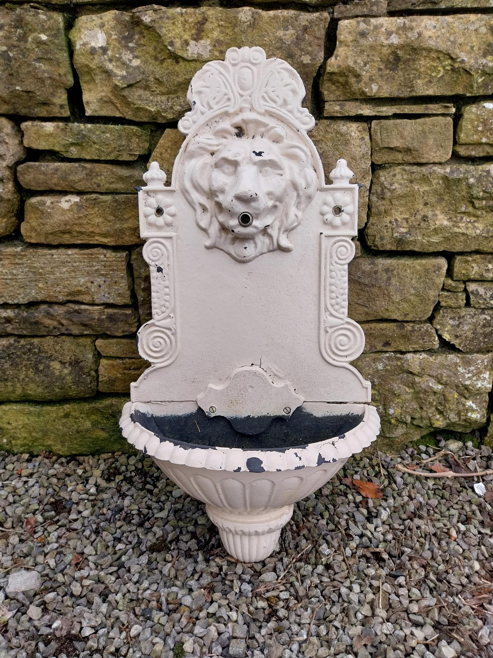 Good quality cast iron wall mounted water feature decorated with Lions mask {80 cm H x 41 cm W x