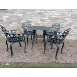 Cast aluminium black garden table four armchairs {Chairs H 80cm x W 58cm x D 50cm Table H 69cm x Dia