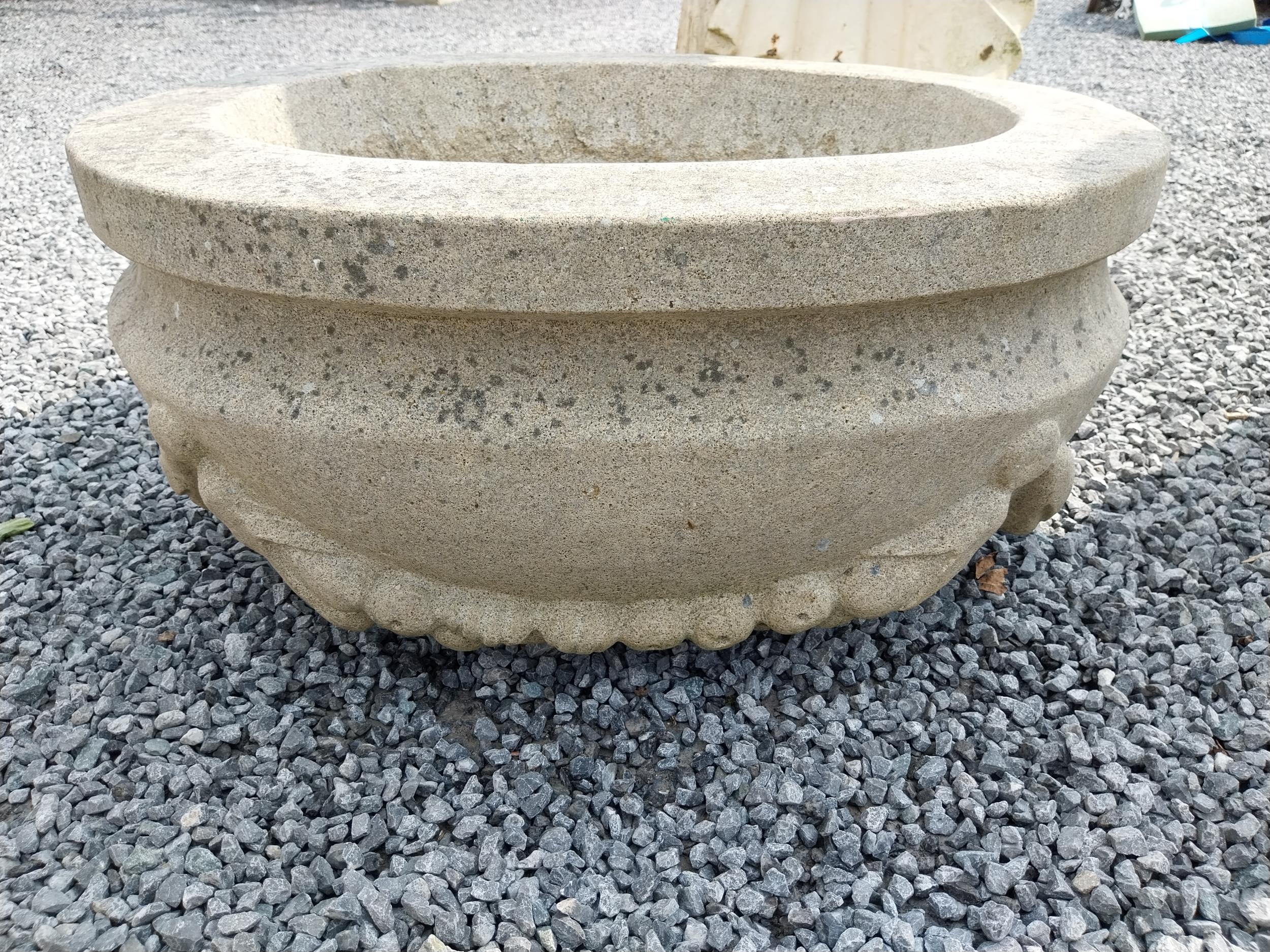 Good quality carved sandstone planter decorated with swags {37 cm H x 80 cm W x 61 cm D}.