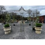 Good quality wrought iron gazebo with ivy leaf decoration and eight arched doorways {350 cm H x