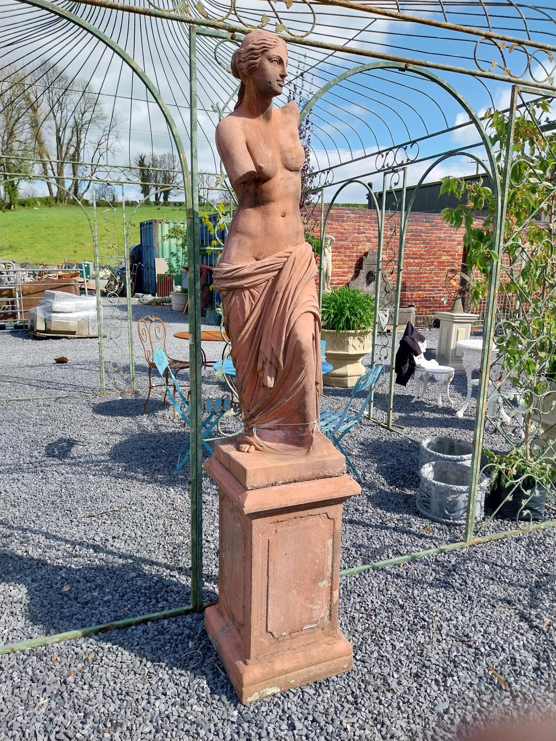 Moulded terracotta Venus de Milo statue raised on pedestal {200 cm H x 47 cm W x 47 cm D}. - Image 2 of 10