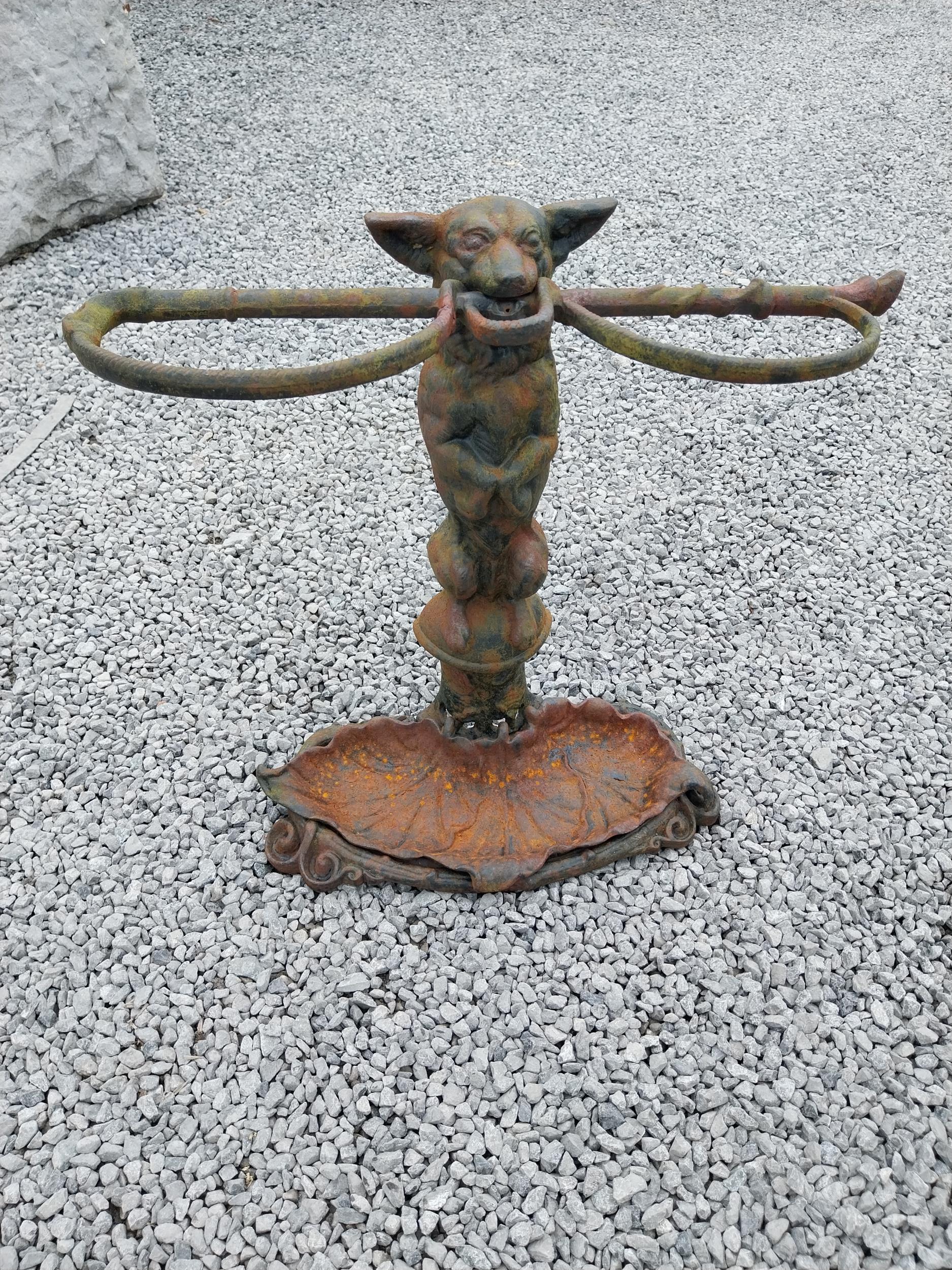 Cast iron stick stand depicting a dog in the Coalbrookdale style {58 cm H x 60 cm W x 20 cm D}. - Image 2 of 6