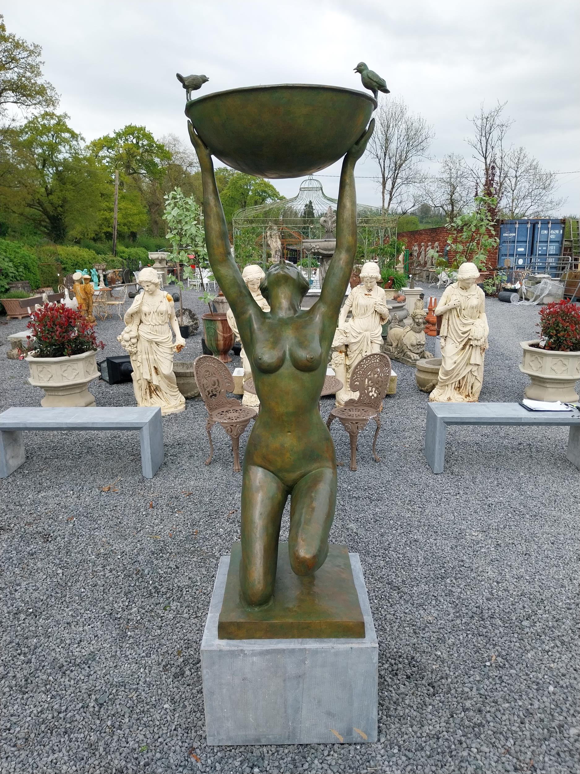 Exceptional quality bronze water feature or bird bath depicting an Art Deco lady raised on slate