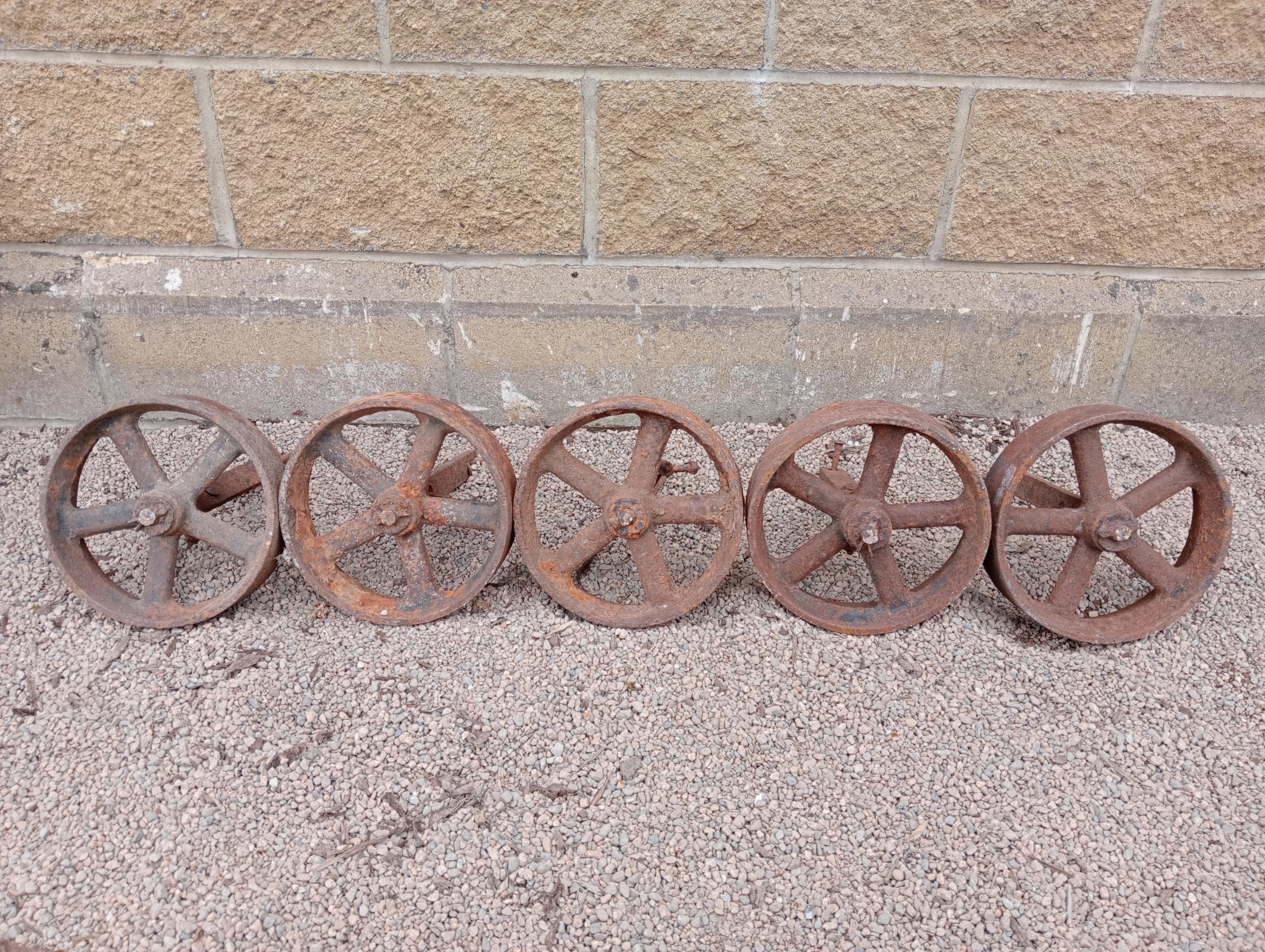 Collection of five cast iron shepherd hut wheels {Dia 24cm x D 7cm }. (NOT AVAILABLE TO VIEW IN