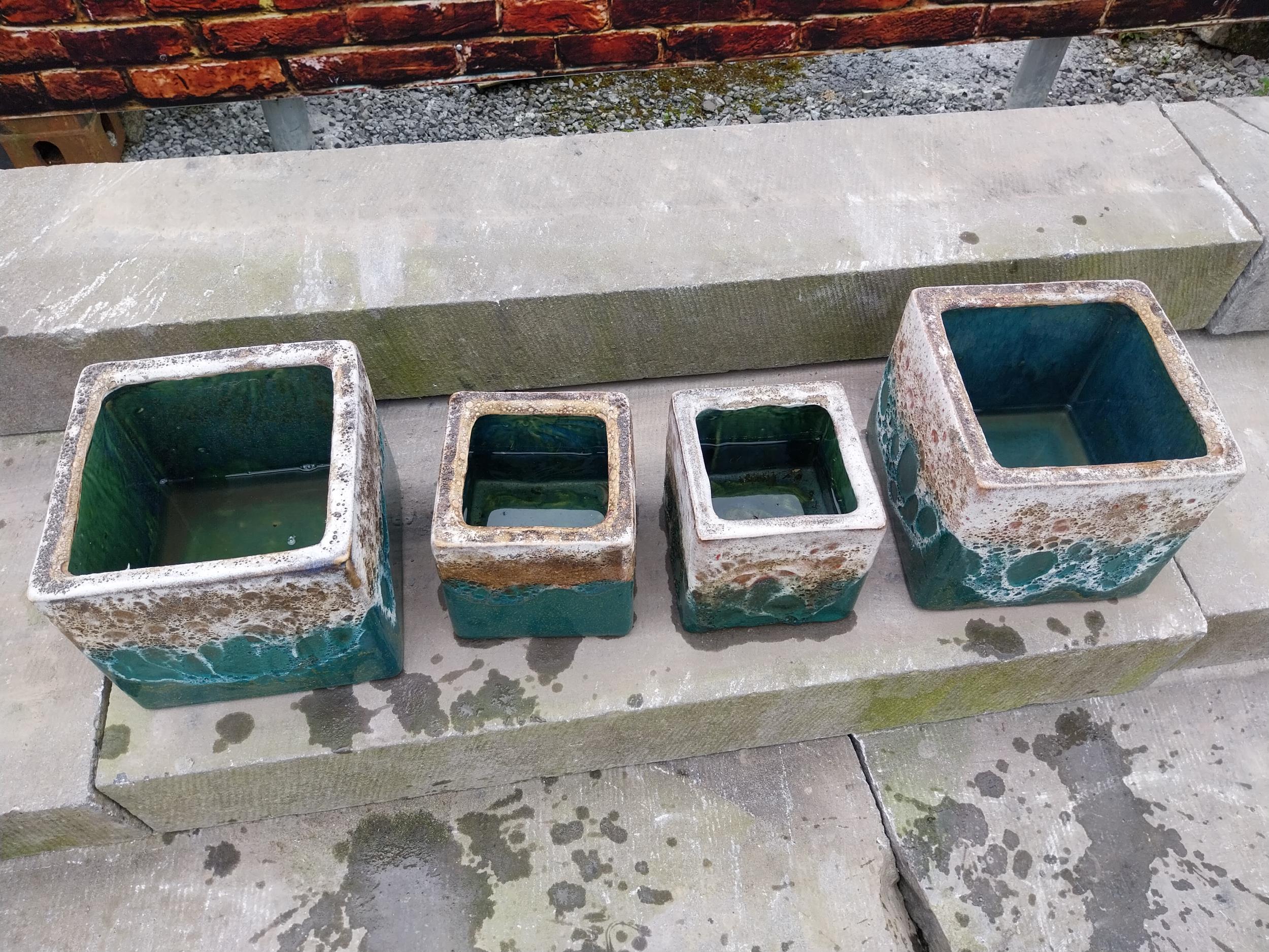 Set of four Atlantis glazed terracotta plant pots {20 cm H x 22 cm W x 22 cm D and 16 cm H x 15 cm W - Image 6 of 11