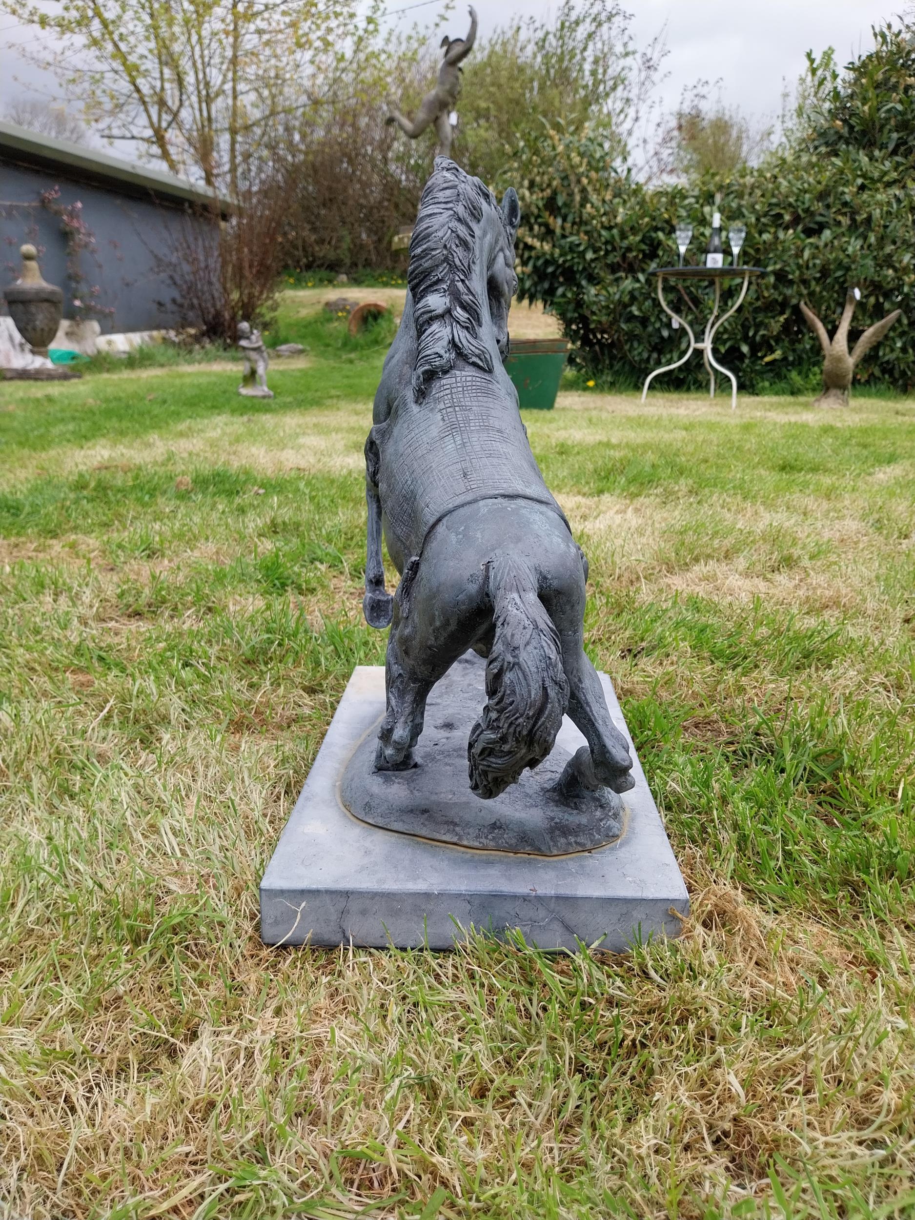 Bronze sculpture of a rearing Horse mounted on slate base {52 cm H x 41 cm W x 26 cm D}. - Image 5 of 6