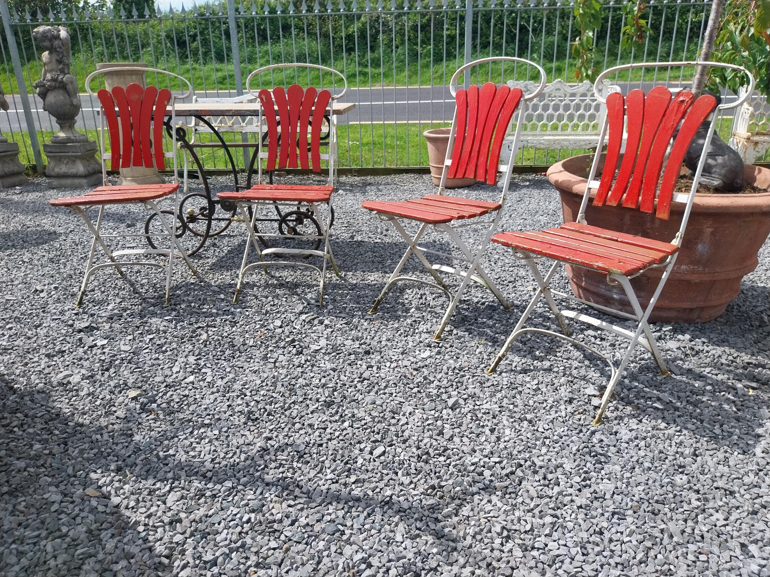 Set of four early 20th C. wrought iron folding garden chairs with wooden slats {90 cm H x 44 cm W