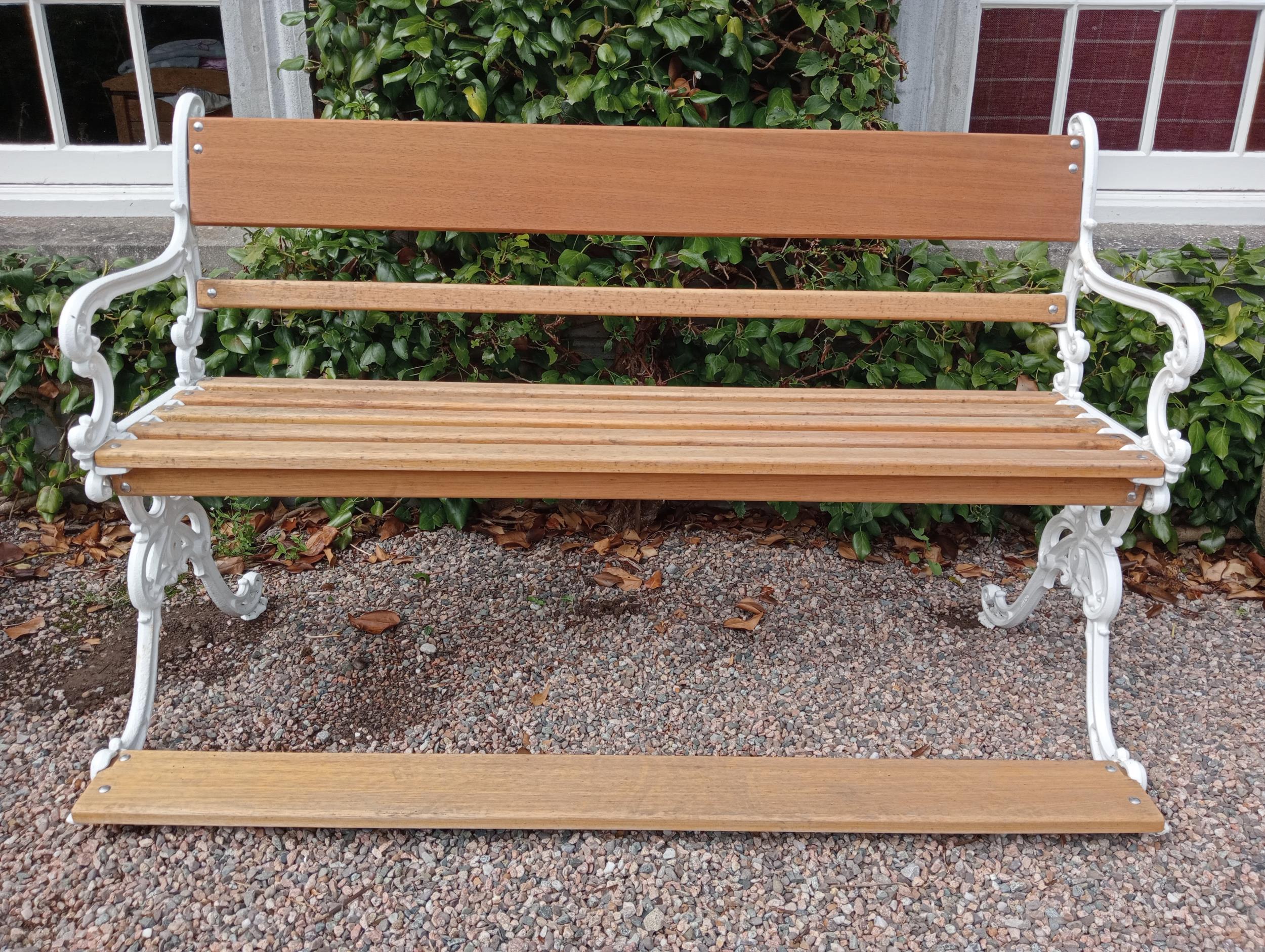 Rare step-up cast iron bench with wooden slats in the Coalbrookdale style {H 98cm x W 158cm x D 74cm