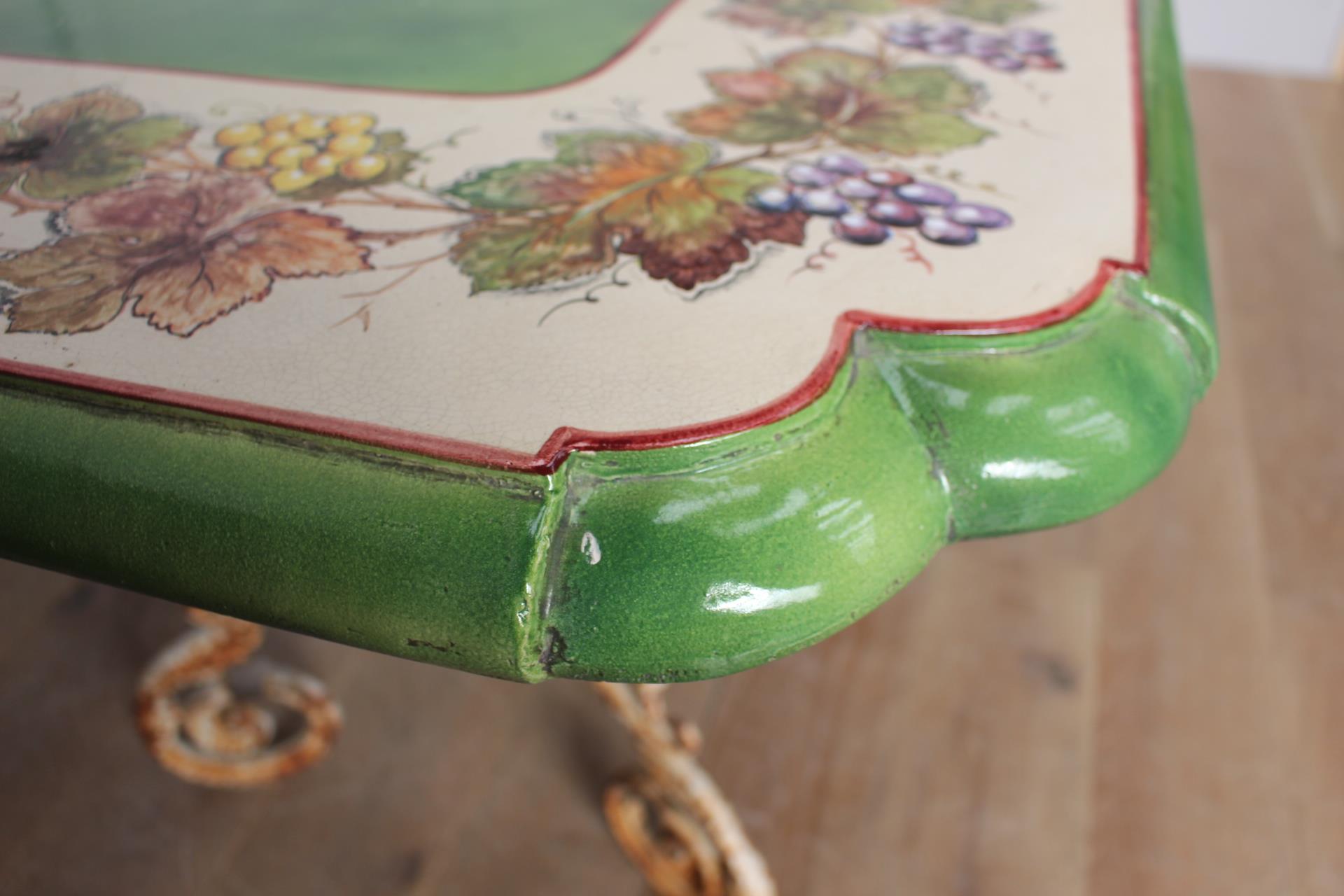 Handmade and hand painted ceramic table raised on cast iron scroll base {H 79cm x W 200cm x D - Image 4 of 4