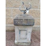 Wrought iron Armorial sundial raised on composition stone square pedestal {H 80cm x 33 x 33}. (NOT