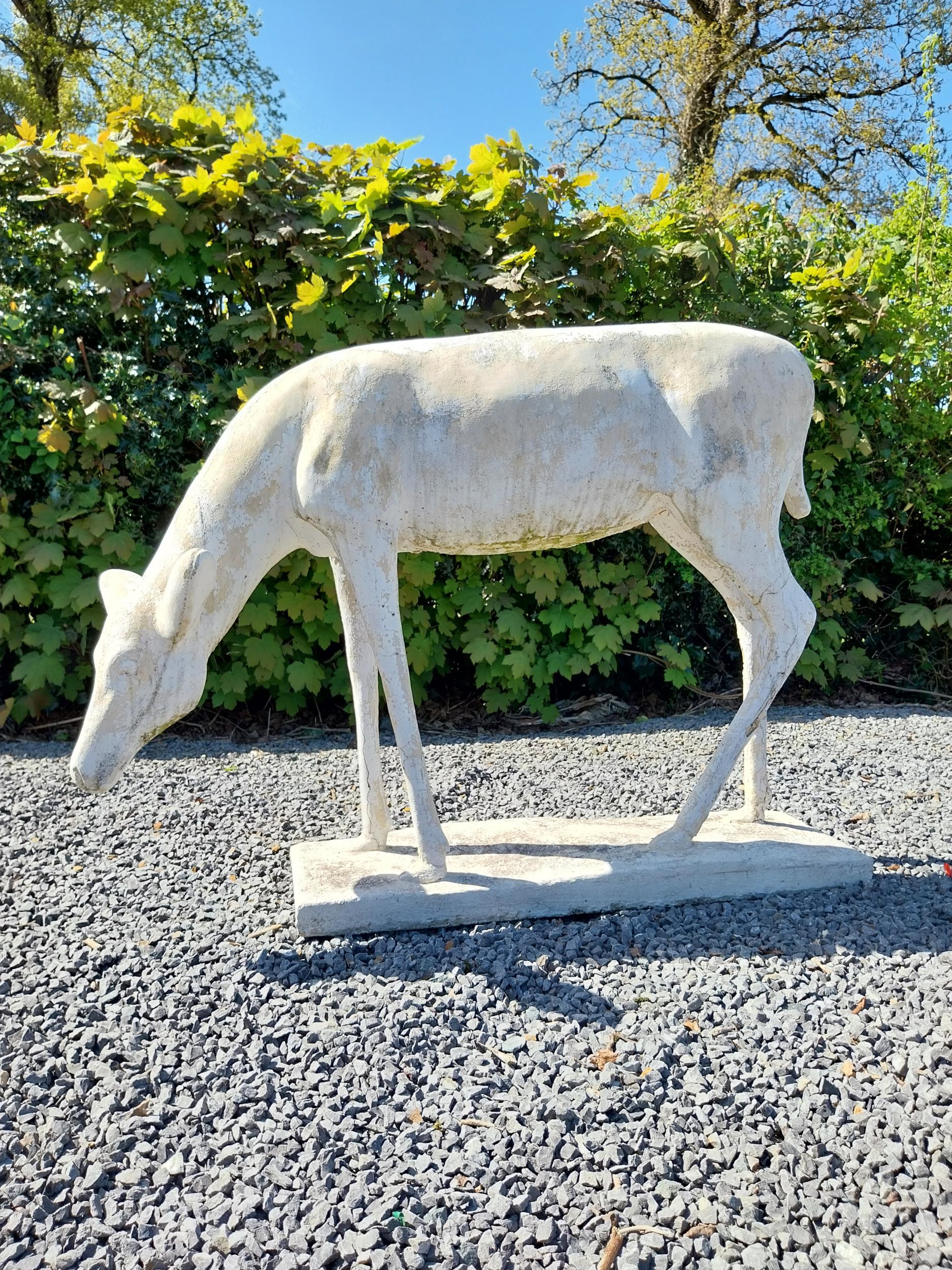 Moulded stone statue of a Deer {88 cm H x 122 cm W x 77 cm D}.