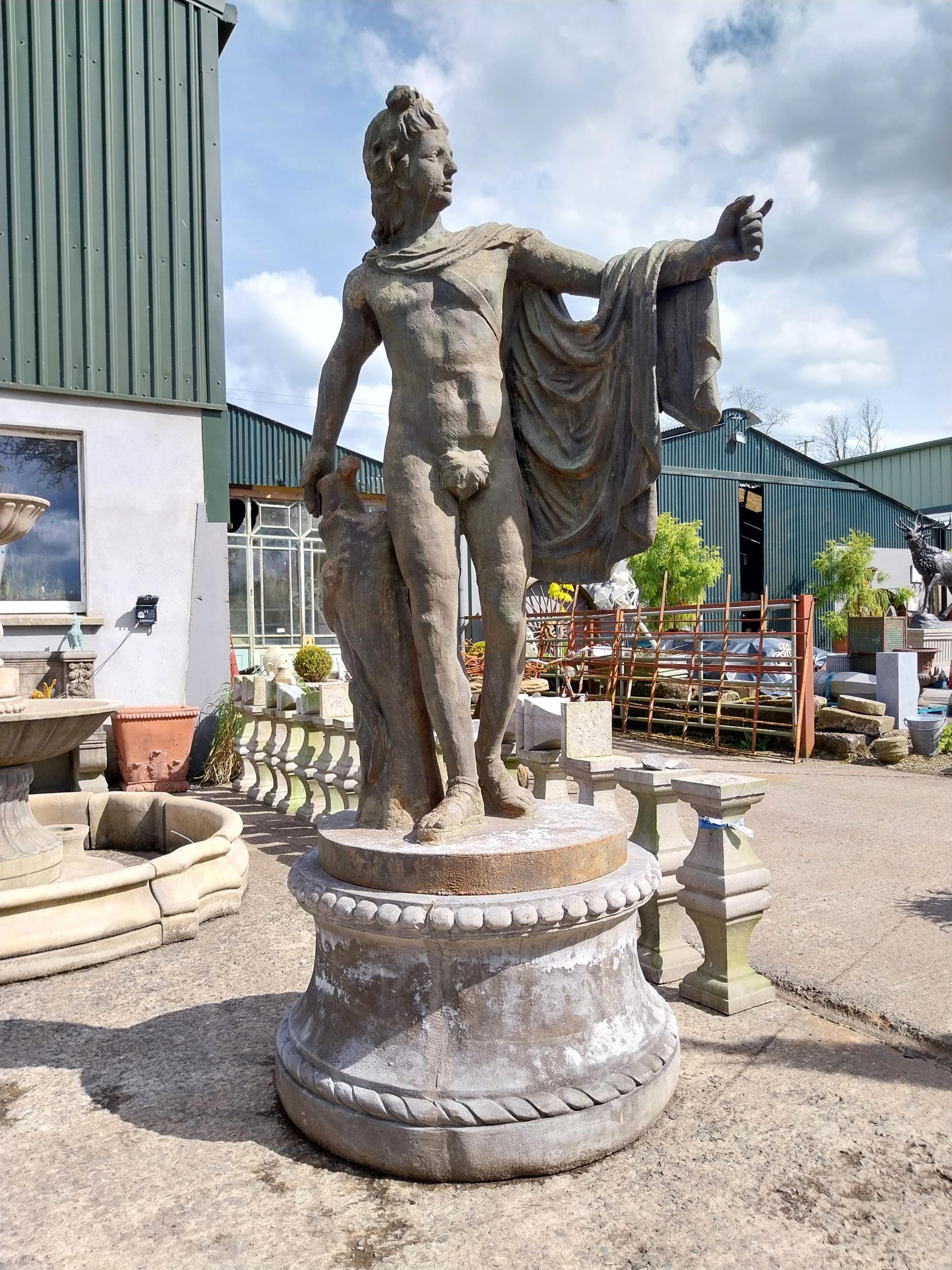 Good quality cast iron life-size statue of Apollo Belvedere raised on composition pedestal {233 cm H