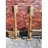 Pair of cast iron 1/2 and 1/4 mile markers {133 cm H x 24 cm W x 24 cm D}.