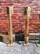Pair of cast iron 1/2 and 1/4 mile markers {133 cm H x 24 cm W x 24 cm D}.
