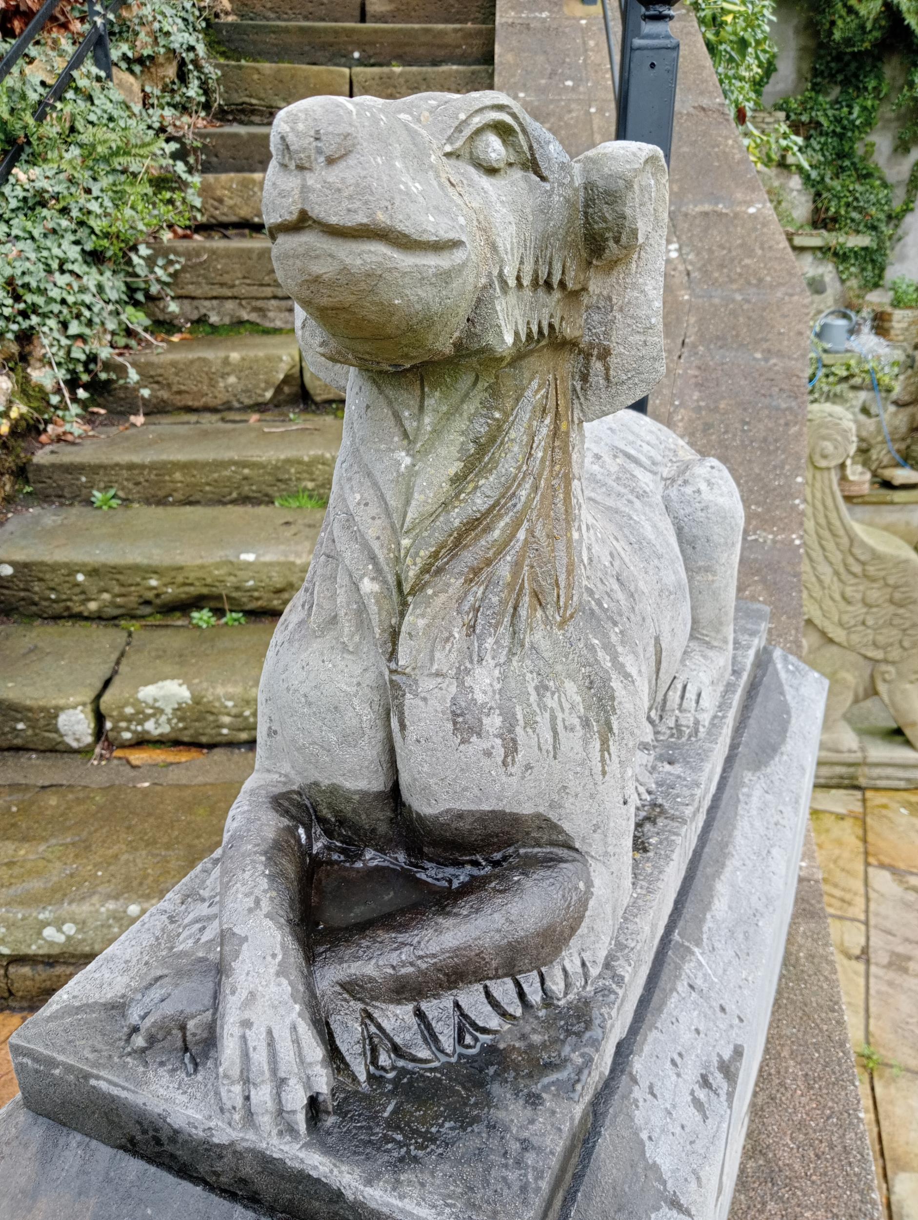 Pair of stone dogs raised on plinths {H 87cm x W 40cm x D 90cm }. (NOT AVAILABLE TO VIEW IN PERSON) - Image 2 of 5