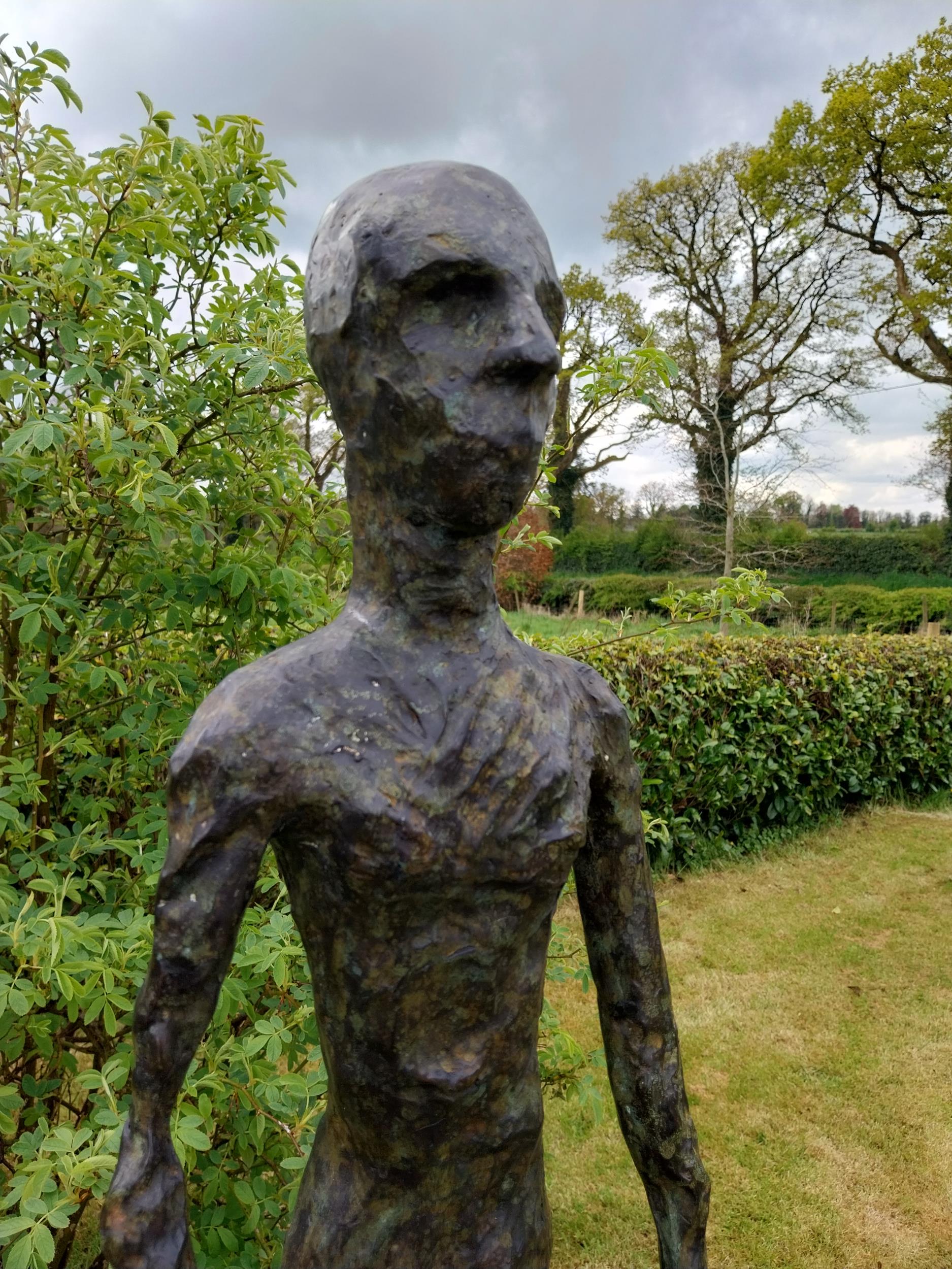 Exceptional quality contemporary bronze sculpture of a Man raised on slate plinth {Overall - Image 3 of 9