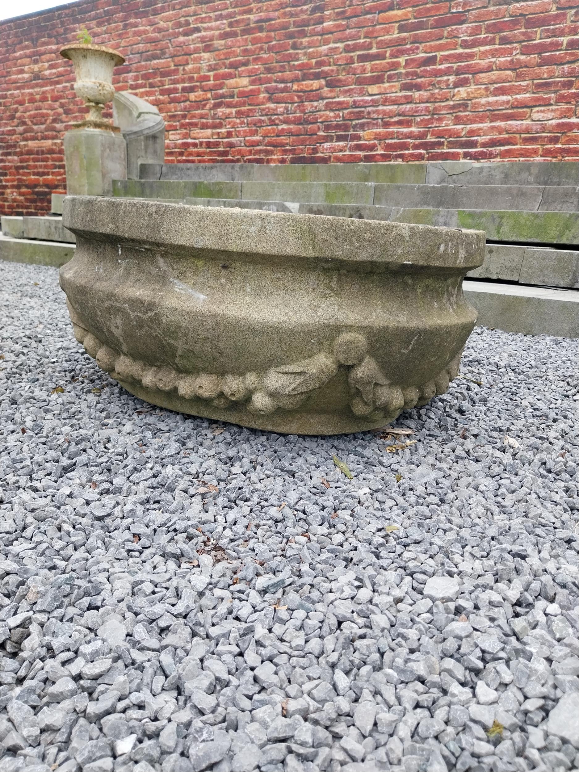 Good quality carved sandstone planter decorated with swags {37 cm H x 80 cm W x 61 cm D}. - Image 3 of 7